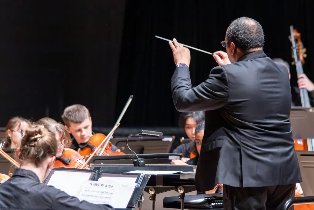 HPYO with conductor Armand Hall